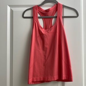 Swiftly tech racerback tank top cropped. Pink.